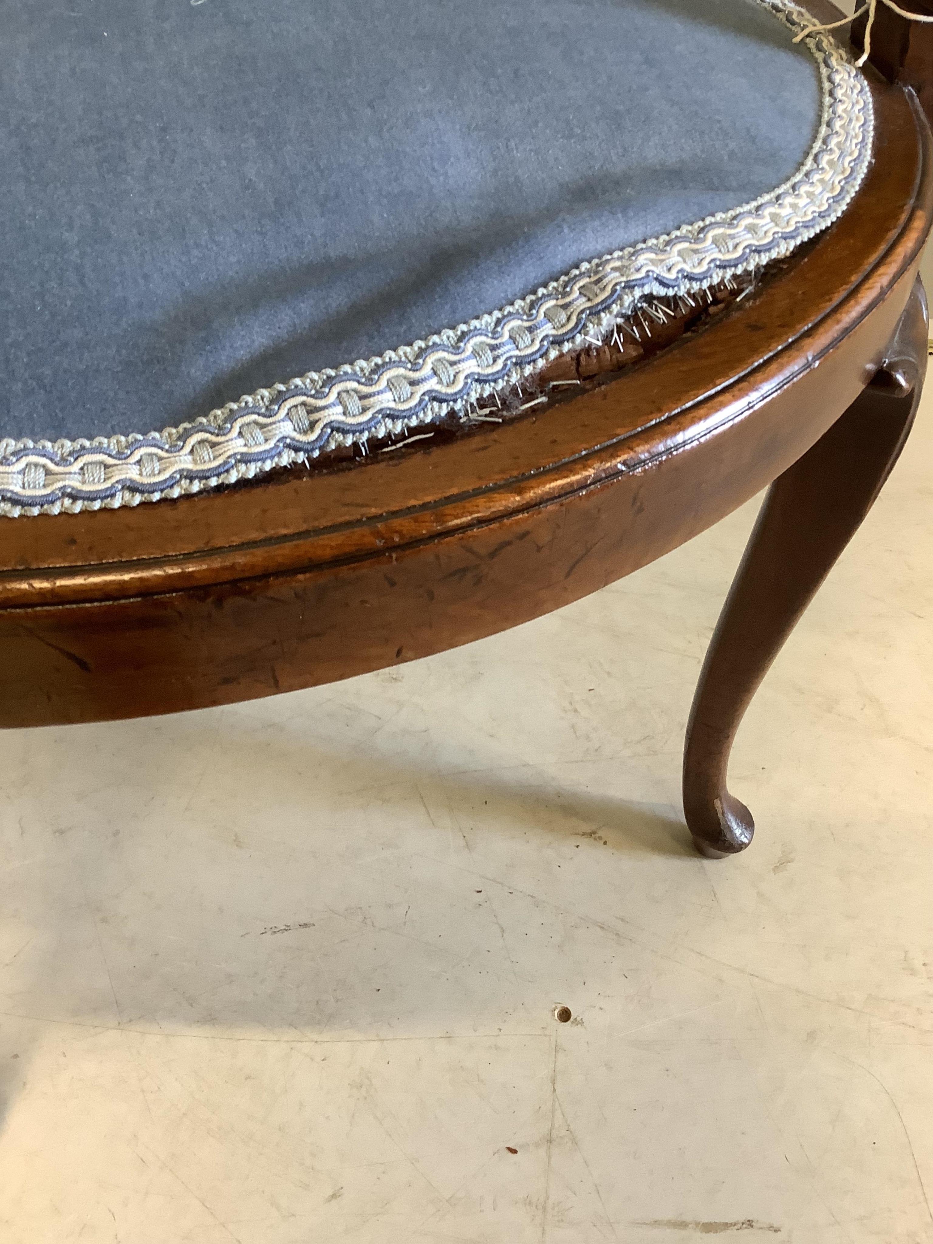 A carved and moulded mahogany show-wood frame tub chair, on cabriole legs, width 56cm, depth 52cm, height 78cm